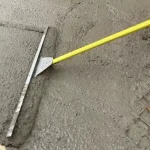 Betongutlegger Snadtools, brukest til utlegging av ferskbetong under gulvstøping